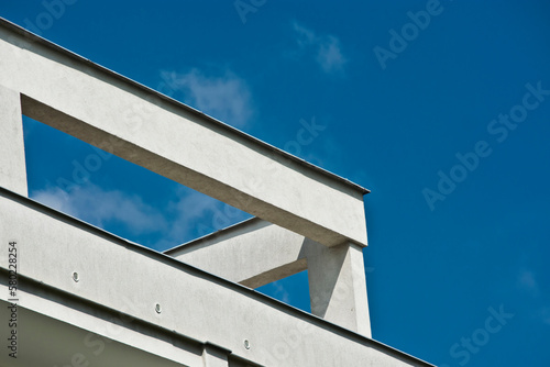 white building structure against a blue sky