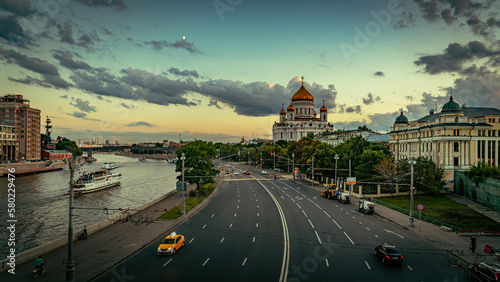Moscow, Russia - Wide city street along the Moscow river with Cathedral of Christ the Saviour in the background