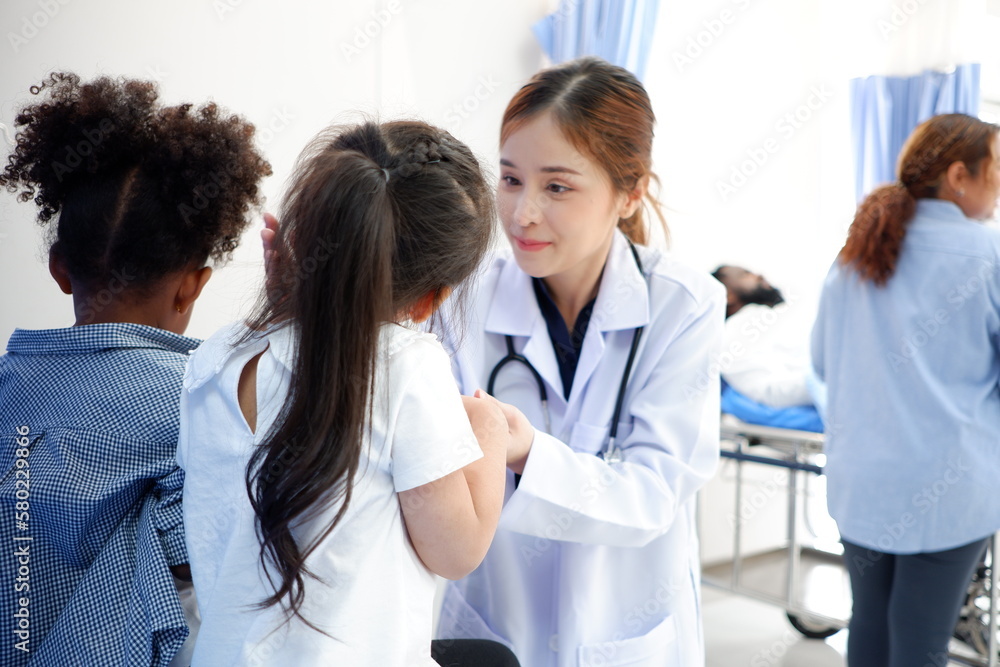 female doctor examining sick girl medical concept. female doctor examining sick girl medical concept.