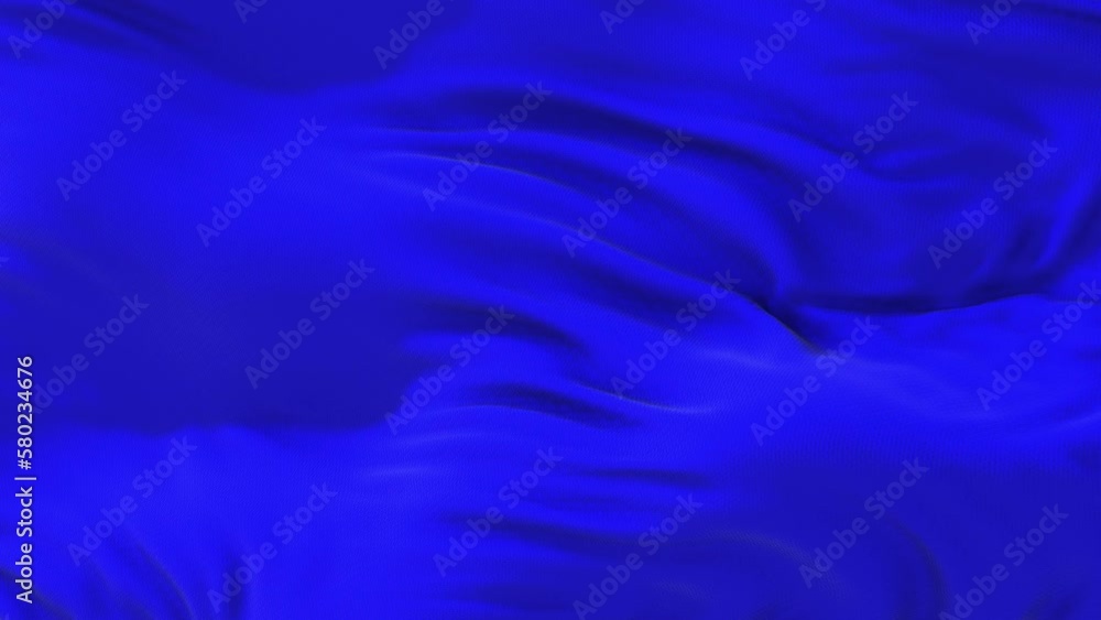 Fabric blue background in motion. Smooth waves of matter waving from the wind. The canvas develops shimmering.
Fabric blue background in motion. Smooth waves of matter waving from the wind. The canvas develops shimmering.