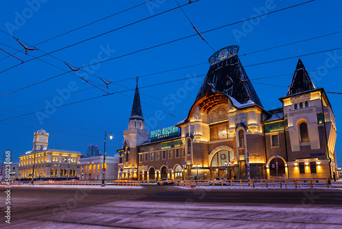 View of Komsomolskaya Square with the buildings of Yaroslavsky railway station, Leningradsky railway station and entrance to Komsomolskaya metro station in the early morning. Moscow, Russia