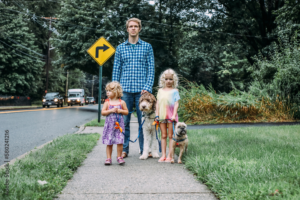 custom made wallpaper toronto digitalFather and daughters standing on footpath with dogs at lawn