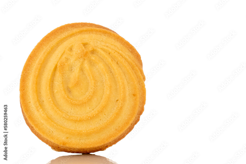 One sweet cookie with butter, macro, isolated on white background. One sweet cookie with butter, macro, isolated on white background.