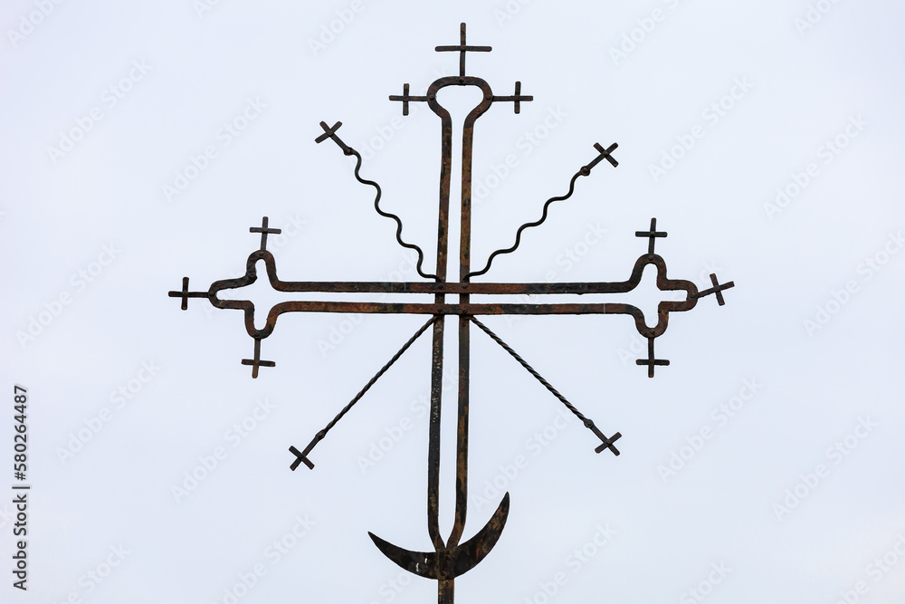 Ancient crosses and a crescent are religious symbols of a mixture of cultures and religions. Background Ancient crosses and a crescent are religious symbols of a mixture of cultures and religions. Background