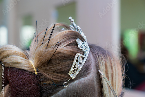 The process of creating hairstyles, hair care. Background, selective focus.