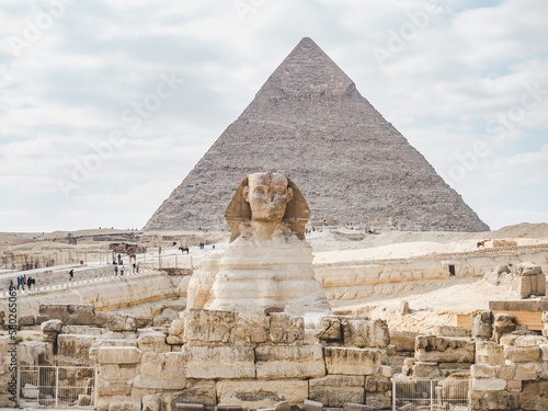 Giza pyramid complex. Photo of pyramids on a clear, sunny day against a blue sky. Vacation and travel concept