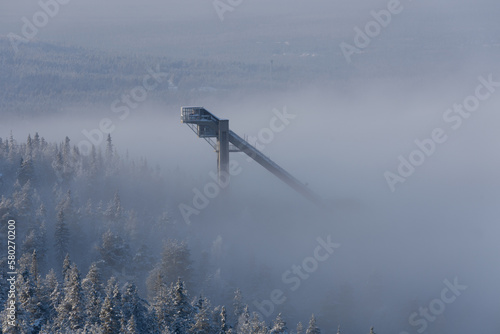 Ounasvaara ski jumping hill in Rovaniemi, Finland, surrounded by fog