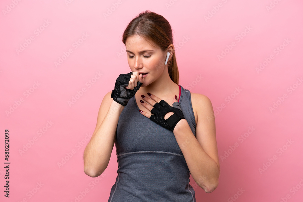 Young sport caucasian woman isolated on pink background is suffering with cough and feeling bad Young sport caucasian woman isolated on pink background is suffering with cough and feeling bad