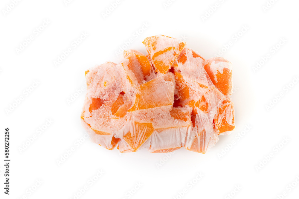 Orange pumpkin chopped in cubes, and frozen for storage Orange pumpkin chopped in cubes, and frozen for storage
