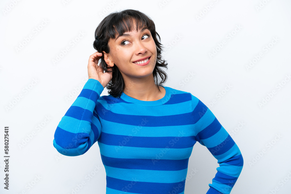 Young Argentinian woman isolated on white background thinking an idea Young Argentinian woman isolated on white background thinking an idea