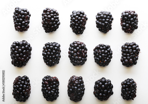 pattern of fresh blackberries on a white background