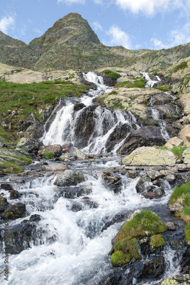 Mountain stream and waterfall in the landscape around the Meris Valley, Valle della Meris, Cottian Alps, Maritime Alps, Western Alps, Italy, Europe Mountain stream and waterfall in the landscape around the Meris Valley, Valle della Meris, Cottian Alps, Maritime Alps, Western Alps, Italy, Europe