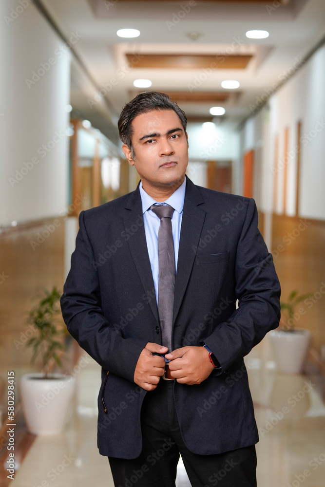 Indian businessman wearing suit and giving expression. Indian businessman wearing suit and giving expression.