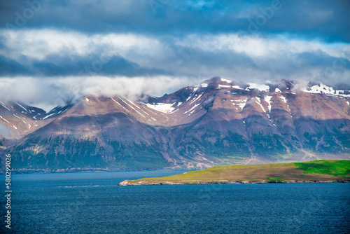 Amazing mountains and ocean in Olafsfjordur, Iceland in summer season