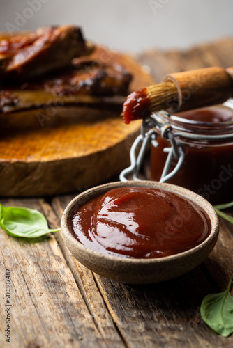 Foto Barbecue sauce in a saucer