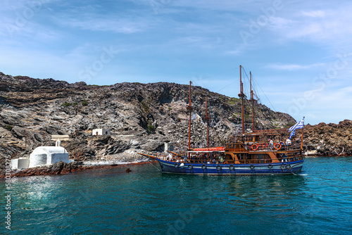 Island Palea Kameni, a ship in a hot spring. Santorini. Greece. photo