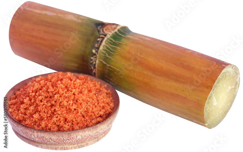 Piece of sugarcane with brown sugar
