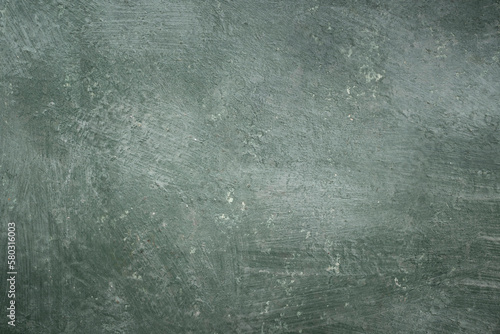 Texture of dark vintage green stone background, Wide banner. Abstract grunge decorative stucco wall texture. Wide rough background with copy space for text