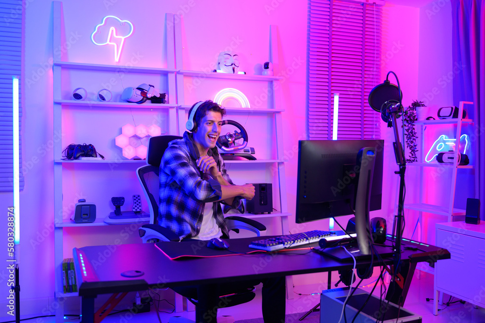 Young Caucasian man Pro Gamer have live streaming and chatting with his fans at home Young Caucasian man Pro Gamer have live streaming and chatting with his fans at home