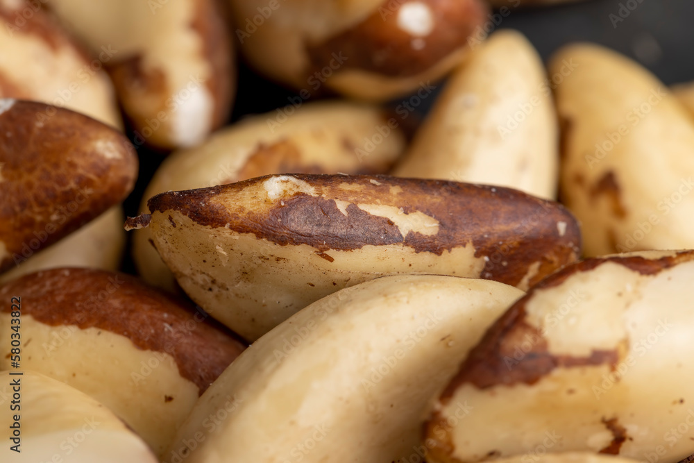 High-quality Brazil nuts peeled from the shell on the table High-quality Brazil nuts peeled from the shell on the table