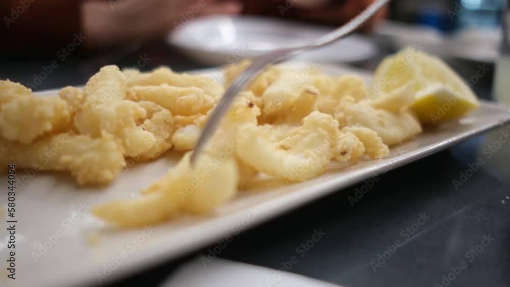 typical spanish tapas seafood fish potatoes tortilla hands children family eating spain vacation healthy food mediterranean typical spanish tapas seafood fish potatoes tortilla hands children family eating spain vacation healthy food mediterranean