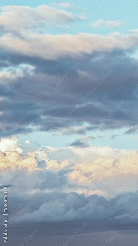 Clouds background. Sunset. Vertical Time lapse Clouds background. Sunset. Vertical Time lapse