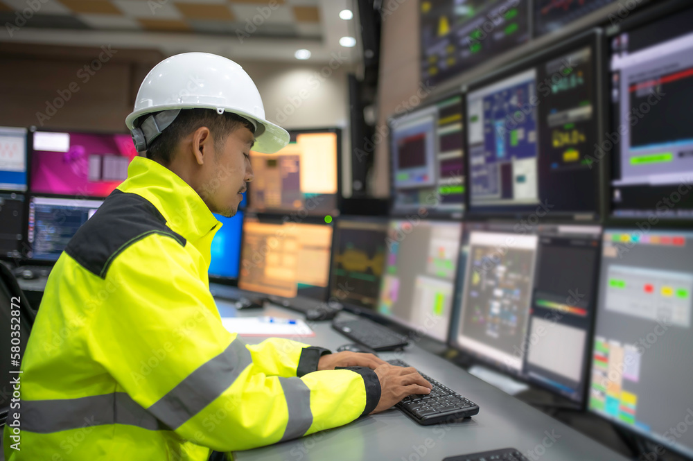 Engineer working at control room,Manager control system,Technician man
