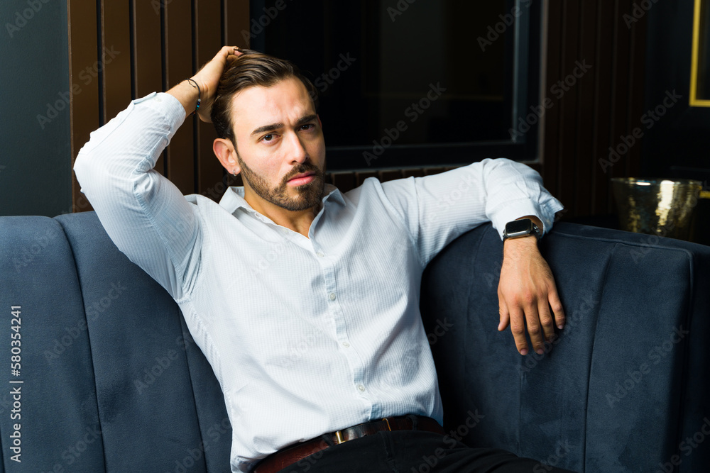 Portrait of a sharp elegant man looking at the camera Portrait of a sharp elegant man looking at the camera