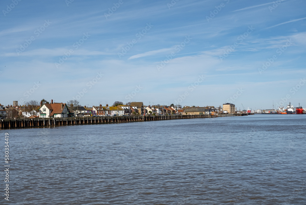 View down the River Yare towards the seaside towns of Great Yarmouth on the East and Gorleston on the West. Captured on a bright and sunny day