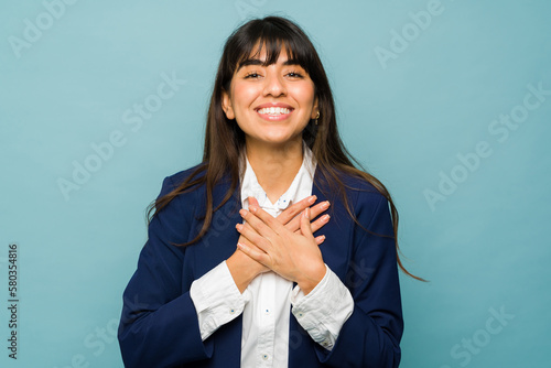 Fotografie Relaxed happy woman grateful for her business