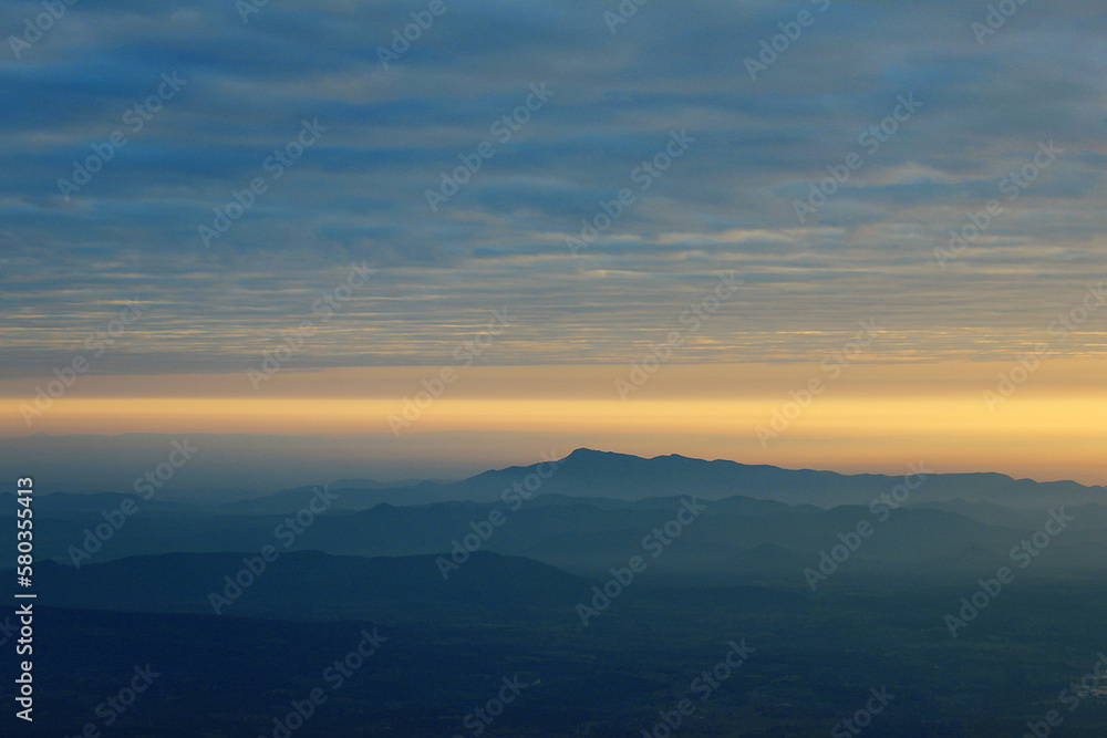 mountain at sunrise at view point at pha mak duk at phukradueng national park