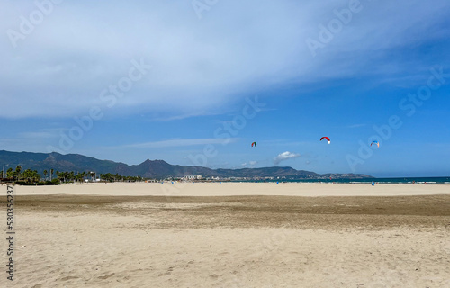 Kite surfing on the sandy beach