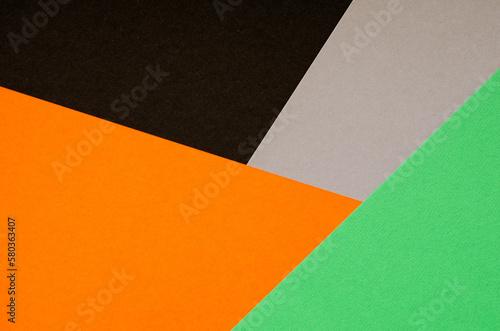 multicolored geometric paper background, copy space