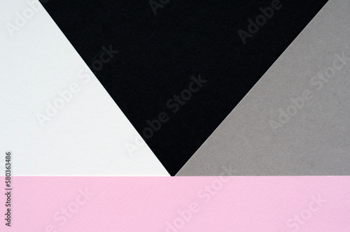 multicolored geometric paper background, copy space