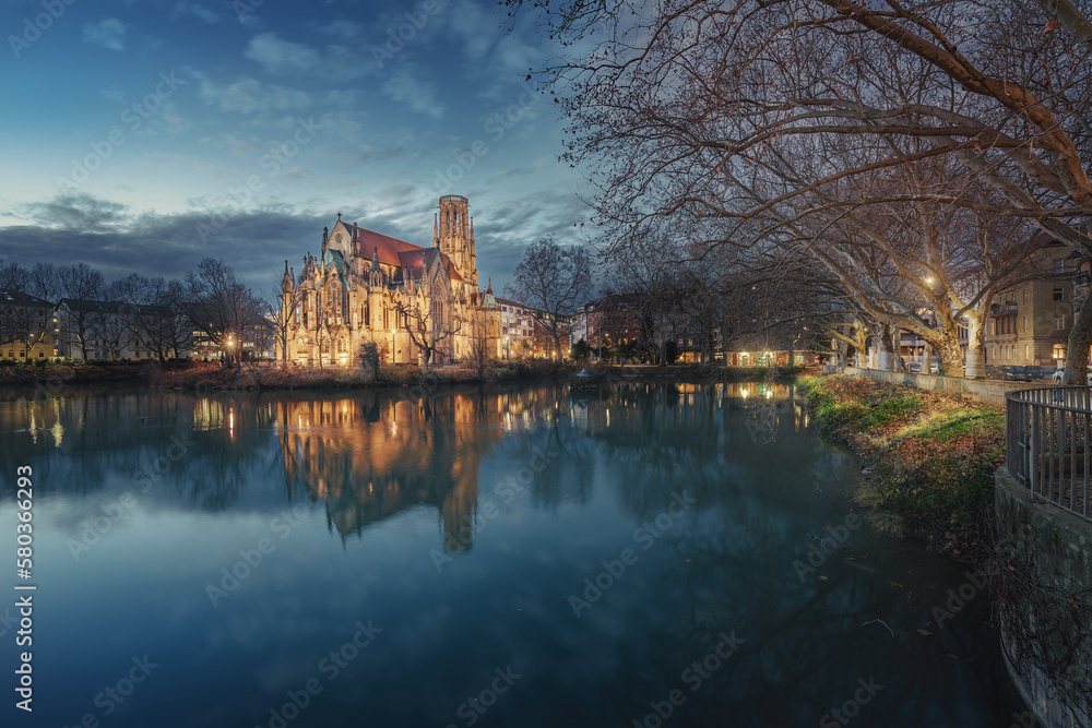 Fototapeta premium St. John's Church (Johanneskirche) and Feuersee lake at night - Stuttgart, Germany