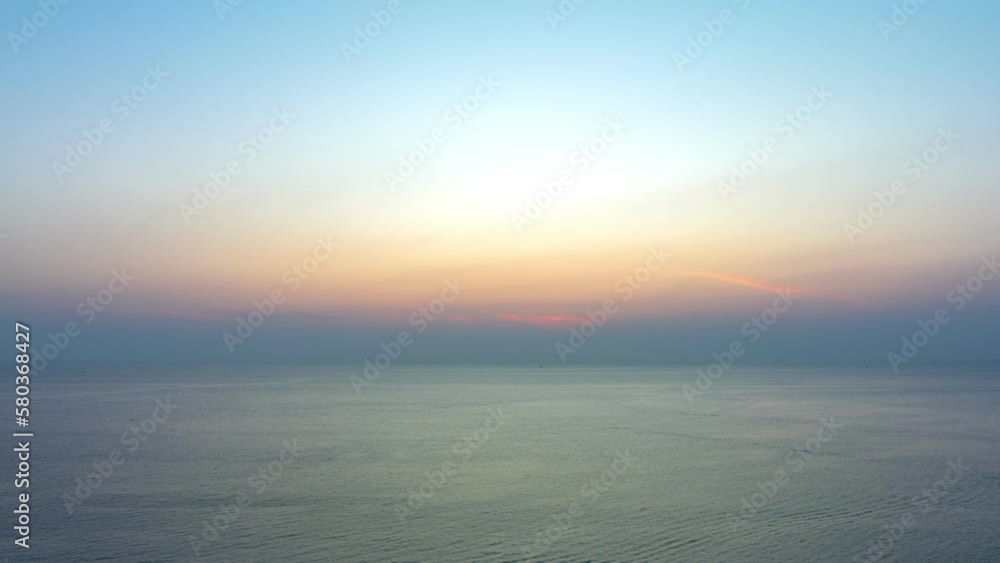 aerial hyperlapse lapse view sweet sky in sunset above the sea at Karon beach Phuket..Gradient color. Sky texture, abstract nature background..Sunset with strong color clouds light rays aerial hyperlapse lapse view sweet sky in sunset above the sea at Karon beach Phuket..Gradient color. Sky texture, abstract nature background..Sunset with strong color clouds light rays