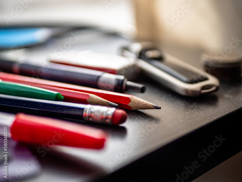 Real life Working from Home Office - A typical working from home office desk, compact and ergonomic workstation, complete with a computer or laptop, a keyboard and mouse,  and storage for documents