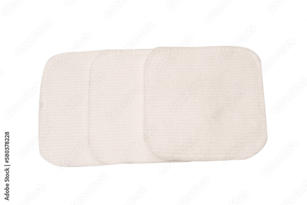 Stack of white cotton sponges isolated on a white background. Stack of white cotton sponges isolated on a white background.