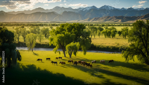 Majestic Mountain Range and Wild Horses in a Serene Valley