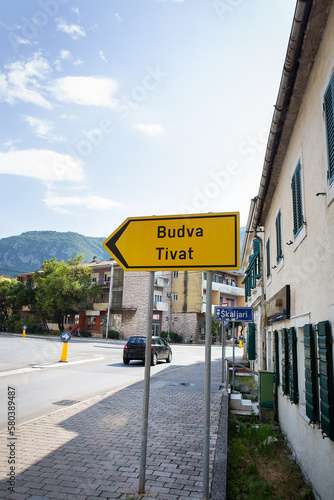 Photo of a road sign with the inscription of the cities of Budva and Tivat 05. 07. 2021 Kotor, Montenegro. photo