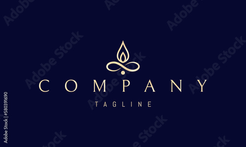 Vector golden logo on which an abstract image of the infinity sign with a leaf in the form of a candle flame on top.