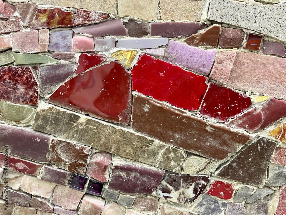 Fragment of mosaic of colored stones. Texture, background