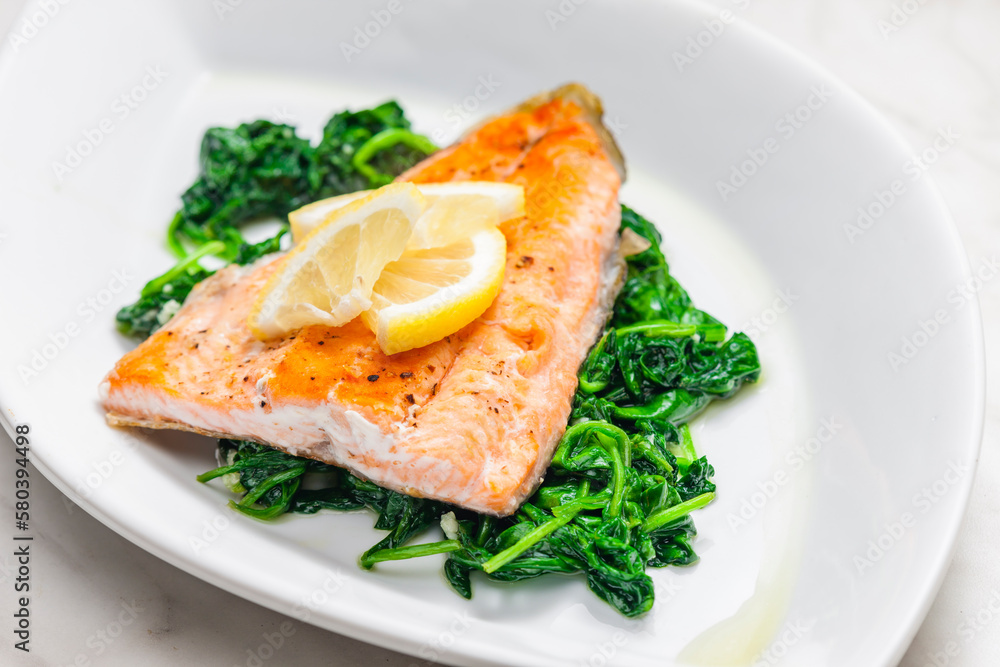 grilled salmon fillet with spinach leaves salad grilled salmon fillet with spinach leaves salad