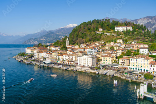 Aerial waterfront cityscape of Bellagio, one of the most picturesque towns on the shore of Lake Como. Charming location with typical Italian atmosphere. Bellagio, Italy.