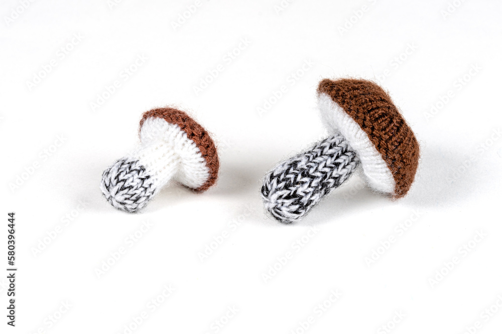 handmade knitted mushrooms isolated on white background handmade knitted mushrooms isolated on white background