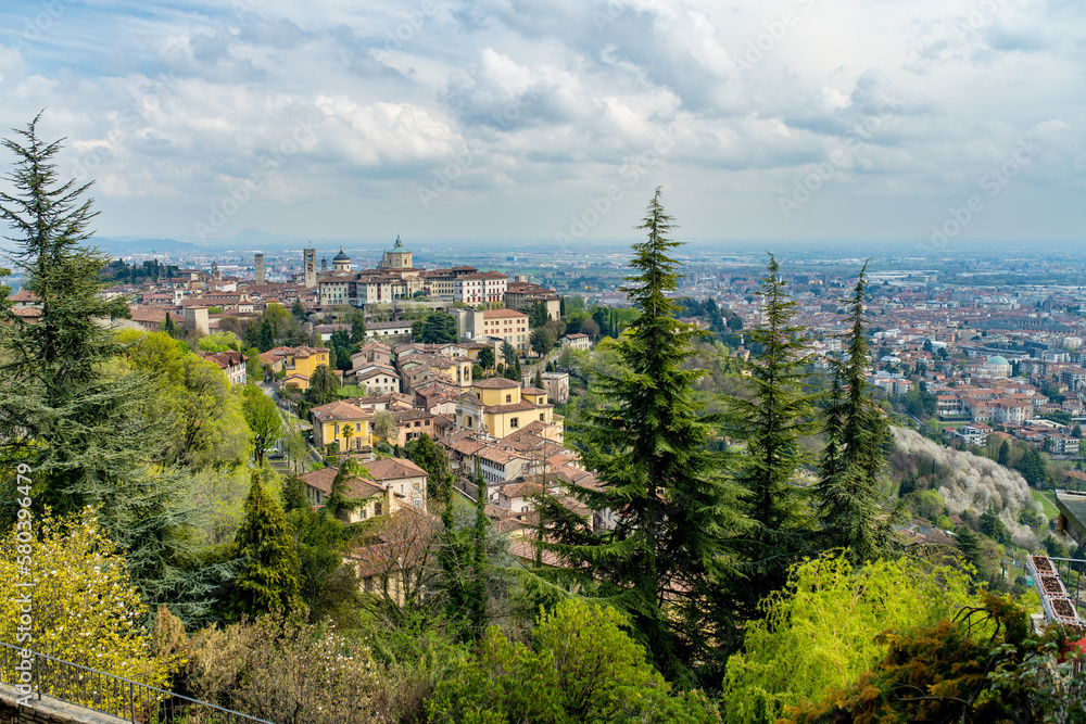 Scenic view of Bergamo city northeast of Milan. Citta Alta, town's upper district, known by cobblestone streets and encircled by Venetian walls. Bergamo, Italy.