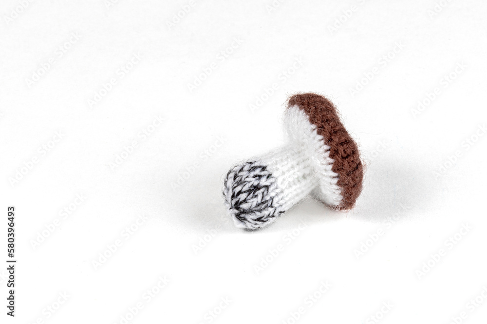 handmade knitted mushrooms isolated on white background handmade knitted mushrooms isolated on white background