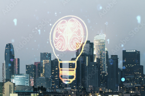Double exposure of abstract virtual creative light bulb hologram with human brain on Los Angeles city skyscrapers background, idea and brainstorming concept
