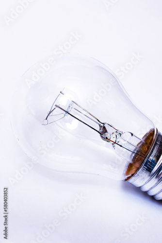 Old light bulb on a gray background