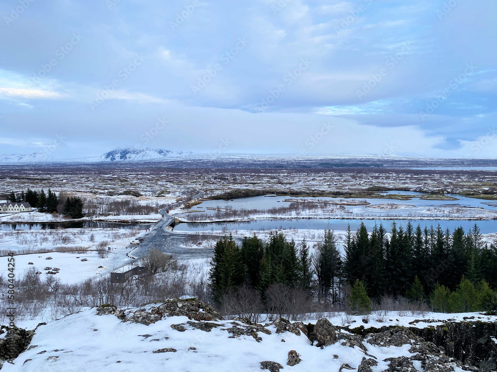 Icelandic landscape with fjord, lake and mountains in winter at Pingvellir National Park